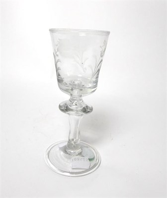 Lot 21 - A Hessen Wine Glass, mid 18th century, the rounded bucket bowl engraved with foliage on a...