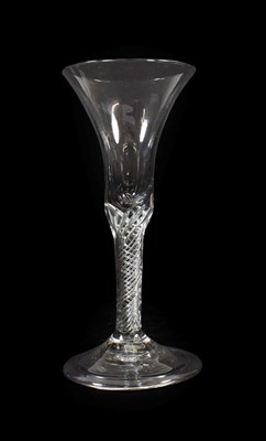 Lot 22 - A Wine Glass, circa 1760, the bell shaped bowl on an air twist stem and folded foot, 20cm high