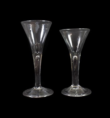 Lot 23 - A Wine Glass, circa 1750, the trumpet bowl on plain stem with air tear and folded foot, 18cm...