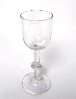Lot 31 - A Wine Glass, circa 1750, the ovoid bowl with basal blade knop on a plain stem with annular...