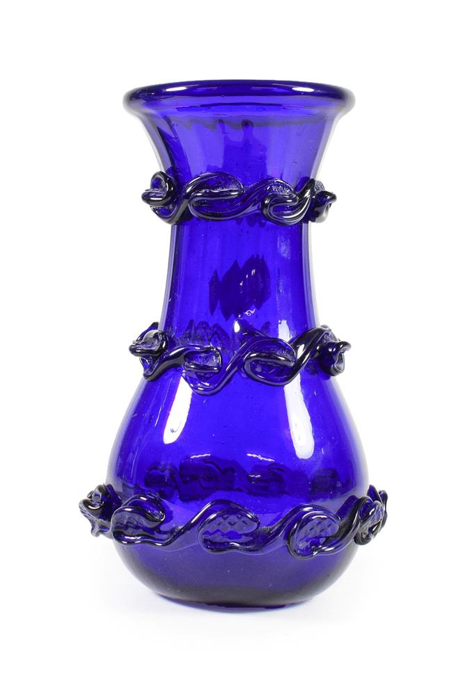 Lot 36 - A ''Bristol'' Blue Glass Baluster Vase, early 19th century, of fluted form with folded rim and...