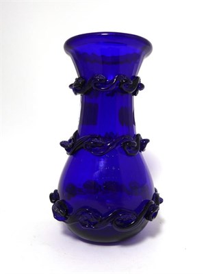 Lot 36 - A ''Bristol'' Blue Glass Baluster Vase, early 19th century, of fluted form with folded rim and...