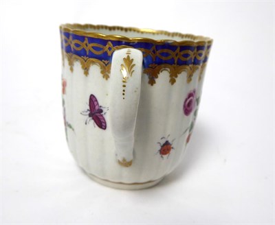Lot 45 - A Worcester Porcelain Fluted Coffee Cup and Saucer of Dalhousie Type, circa 1780, each painted with