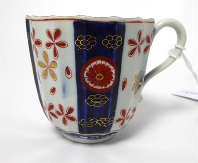 Lot 54 - A Worcester Porcelain Large Coffee Cup and Saucer, circa 1770, of fluted form, painted with the...