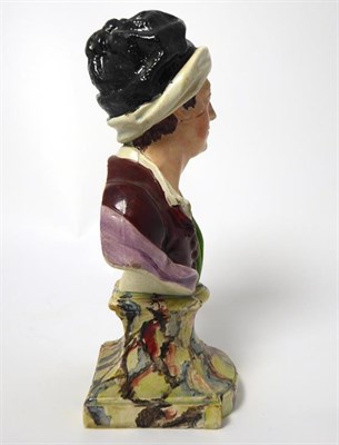 Lot 61 - A Pearlware Bust of Matthew Prior, circa 1800, naturalistically modelled wearing a black and...
