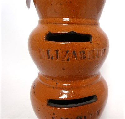 Lot 71 - A Slipware Money Box, late 19th century, of triple gourd form, inscribed MARY ELIZABETH...