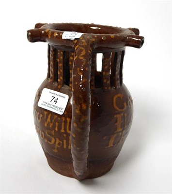 Lot 74 - A Yorkshire Slipware Puzzle Jug, dated 1841, of traditional form with five spouts over a...