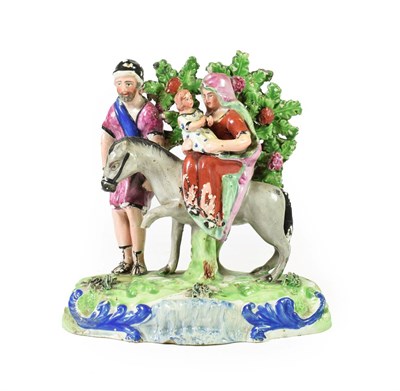 Lot 81 - A Walton Type Pearlware Flight to Egypt Group, circa 1820, modelled as the Holy Family with a...