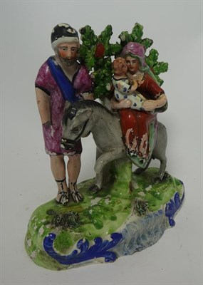 Lot 81 - A Walton Type Pearlware Flight to Egypt Group, circa 1820, modelled as the Holy Family with a...