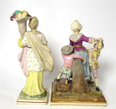 Lot 83 - A Pearlware Figure Group, circa 1810, in Meissen style, modelled as two boys trying to steal...
