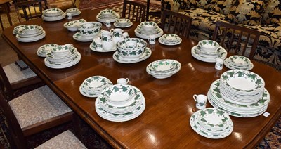 Lot 95 - A Wedgwood Earthenware Dinner Service, modern, decorated with the Napoleon Ivy pattern, printed...