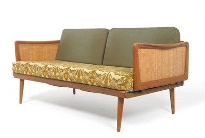 Lot 1743 - A Danish Teak and Cane Sofa, by Peter Hvidt for France & Sons, with cane panels to each end,...