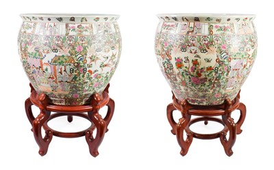 Lot 119 - A Pair of Cantonese Porcelain Fish Bowls, 20th century, typically decorated with figures in...