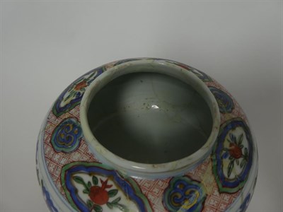 Lot 126 - A Chinese Wucai Porcelain Jar and Matched Cover, in 17th century style, painted with bands of...