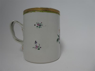 Lot 129 - A Chinese Porcelain Mug, Qianlong, of cylindrical form with scroll handle, painted in famille...