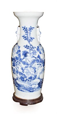 Lot 137 - A Chinese Porcelain Baluster Vase, 19th century, the trumpet neck with mythical beast handles,...