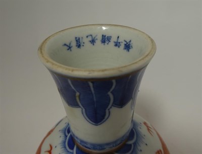 Lot 141 - A Pair of Chinese Porcelain Stem Cups, Guangxu reign marks, painted in underglaze blue and iron red