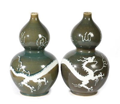 Lot 144 - A Pair of Chinese Porcelain Double Gourd Vases, late Qing/Republic period, with carved white...