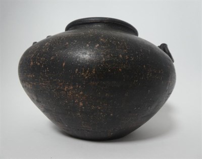Lot 152 - A Chinese Cizhou Style Guan, possibly Ming, of ovoid form, modelled with twin toad handles,...