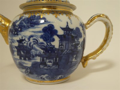 Lot 157 - A Chinese Porcelain Teapot and Cover, Qianlong, of ovoid form, painted in underglaze blue with...