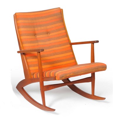 Lot 1748 - A Teak Rocking Chair, designed by Soren Georg Jensen, upholstered in orange and brown stripe...