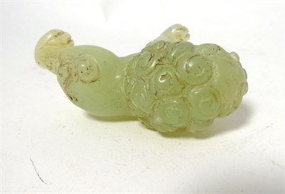 Lot 165 - A Chinese Jade Figure of a Lion, in Ming style, standing four-square, 6.5cm long; A Similar...