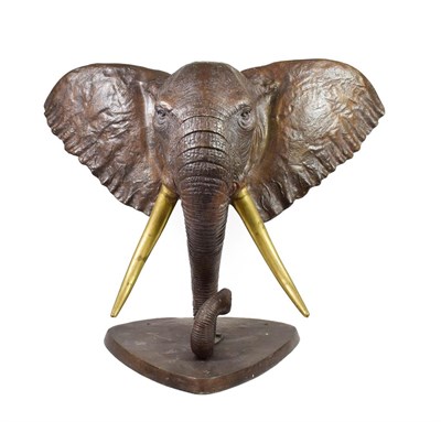 Lot 179 - A Pair of Patinated Bronze Models of Elephant's Heads, 74cm high incomplete, possibly...