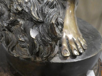 Lot 180 - A Bronze Figure of David, standing, his right foot on Goliath's severed head, on an oval base,...
