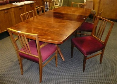 Lot 1750 - A 1960's Gordon Russell Rosewood Dining Room Suite, comprising extending table, shaped...