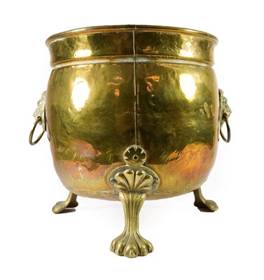 Lot 185 - A Brass Planter, in 17th century style, of ovoid form, with lion mask and loop handles, on...