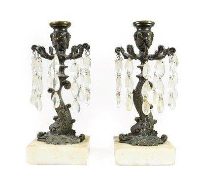 Lot 187 - A Pair of Bronze Lustre Candlesticks, 19th century, with urn shaped sconces and scroll branches...