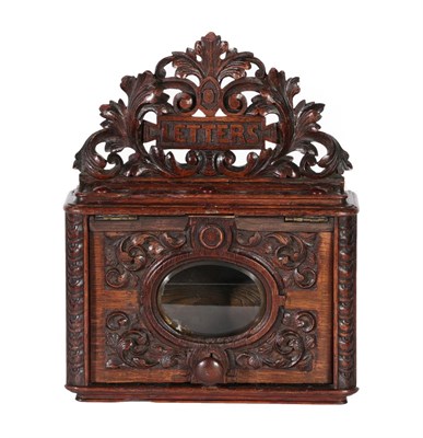 Lot 206 - A Victorian Carved Oak Country House Letterbox, with scrolling oak leaf pierced cresting...