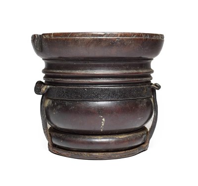 Lot 211 - An Iron Bound Turned Lignum Vitae Mortar, late 17th/early 18th century, of baluster form with...