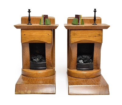 Lot 213 - A Pair of Oak and Painted Wood Bookends, 20th century, each modelled as a fireplace, a...
