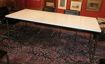 Lot 1754 - An Extending Table, on a black frame and four chrome legs with black circular feet, unmarked, 205cm