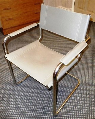 Lot 1758 - A Contemporary Chrome Cantilever Armchair, with grey leather arm rests, seat and back,...