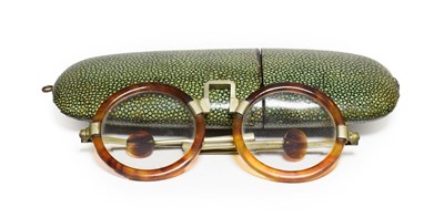 Lot 263 - A Pair of Chinese Brass and Tortoiseshell Spectacles, 19th century, with circular frames and...