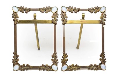 Lot 275 - A Pair of Victorian Gilt Metal Easel-Back Photograph Frames, of rectangular form, the angles...
