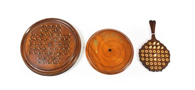 Lot 287 - A Turned Wood Fox and Geese Board, 19th century, of circular form with drilled holes and...