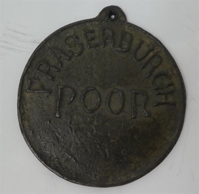 Lot 290 - Fraserburgh, a beggar's badge, of circular form, cast with FRASERBURGH POOR and with single lug...