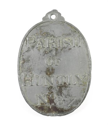 Lot 293 - Huntly, a beggar's badge, of oval form, inscribed PARISH OF HUNTLY No.87, with single...