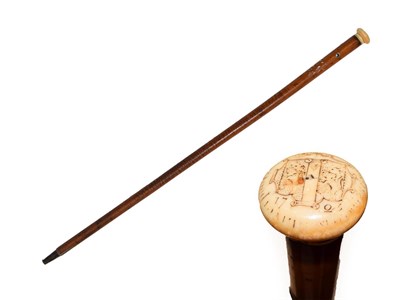 Lot 303 - A Bone Mounted Malacca Walking Stick, dated 1725, engraved with an armorial and the date and...