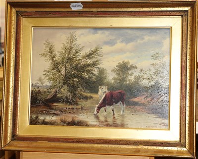 Lot 386 - H Leslie Davis (19th/20th century) Cattle watering on a river  Signed and dated 1899, oil on board