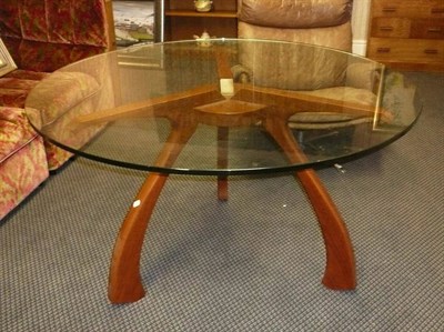 Lot 1769 - A CJI Dining Table, designed by Andre Marx, Angelin Armargo base with toughened glass top, diameter