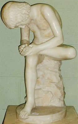 Lot 1133A - Spinario: A Carved Alabaster Figure after the Antique, of a young boy taking a thorn out of his...