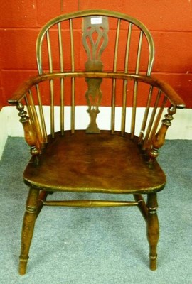 Lot 1288A - A Mid 19th Century Yew Windsor Armchair, the double row back support with pierced splat above...