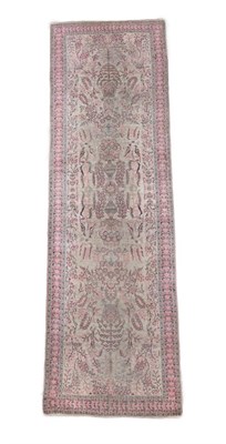 Lot 526 - Kashmir Silk Piled Runner, circa 1970 The ivory field with urns issuing flowers and trailing...
