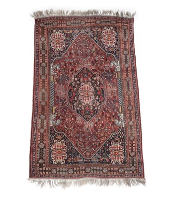 Lot 550 - Kashgai Rug South West Iran, circa 1930 The chestnut brown field of angular plants flanked by horse