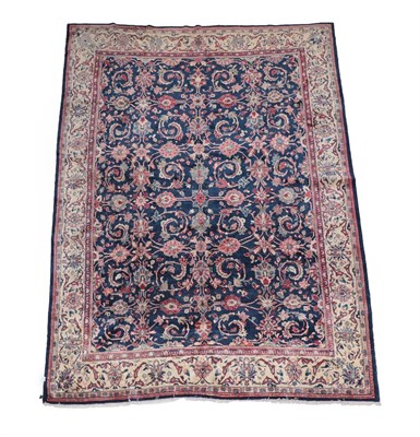 Lot 552 - Saroukh Carpet West Iran, circa 1960 The deep indigo field with an allover design of palmettes...