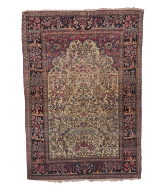 Lot 559 - Isfahan Rug Central Iran, circa 1920 The cream field with trees and plants in bloom beneath the...